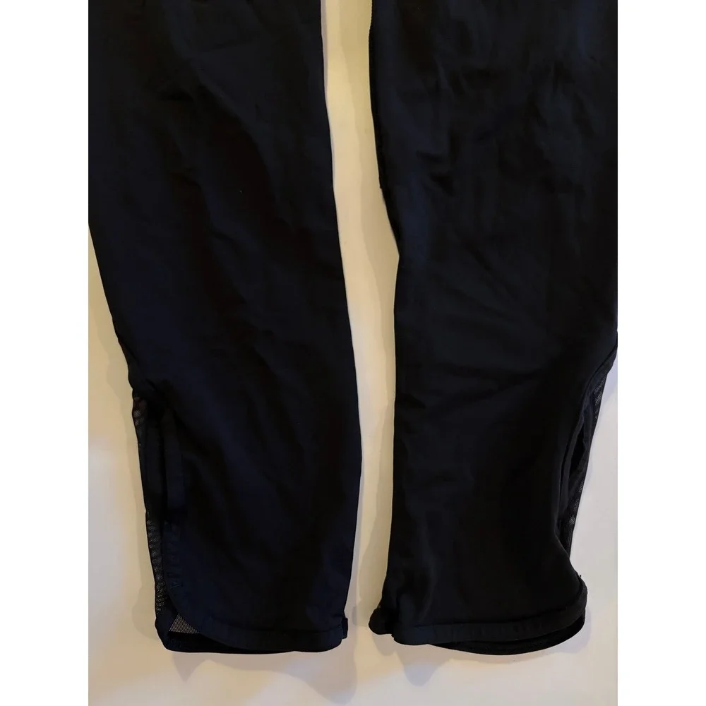 Lululemon Women's Black Crop Leggings Back Zip Pocket  Mesh Panel Running size 4